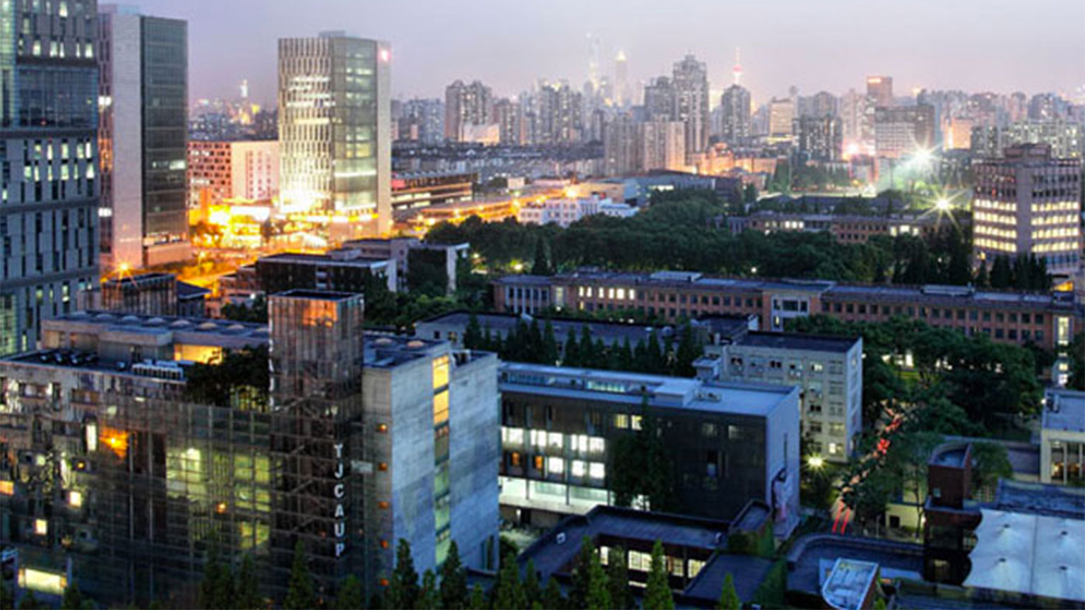A photo of Tongee University in China, at night.
